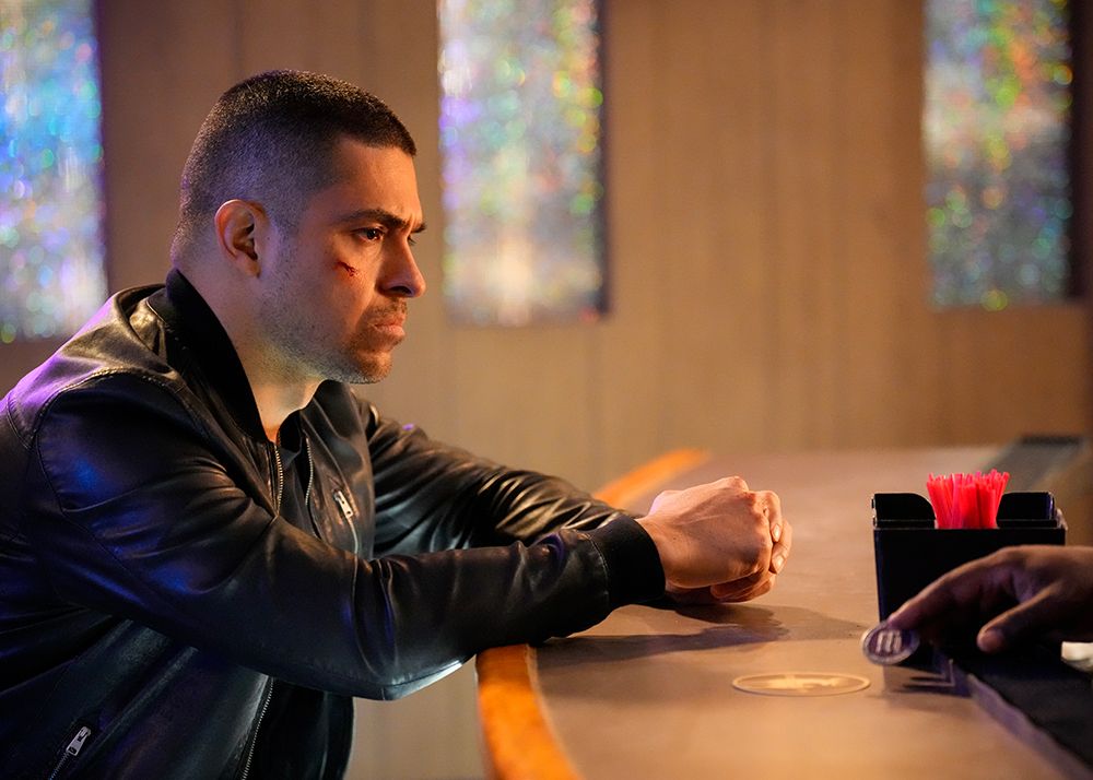 Special Agent Nick Torres sitting at a bar in NCIS series 21