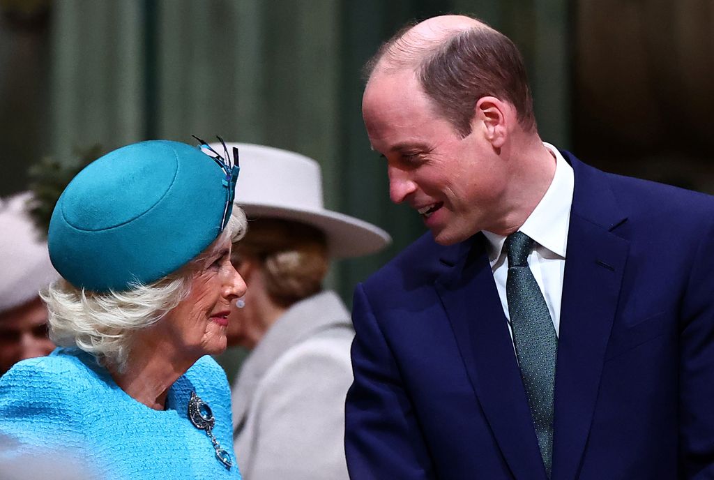 Prince William smiles at Queen Camilla 