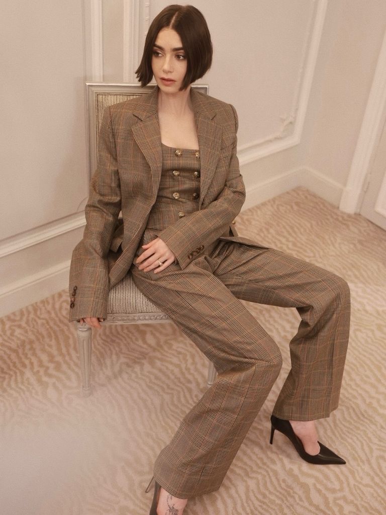 She also wore a stunning checkered suit from Alexander McQueen