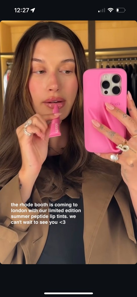 Hailey using a Peptide Lip Tin available in London tomorrow