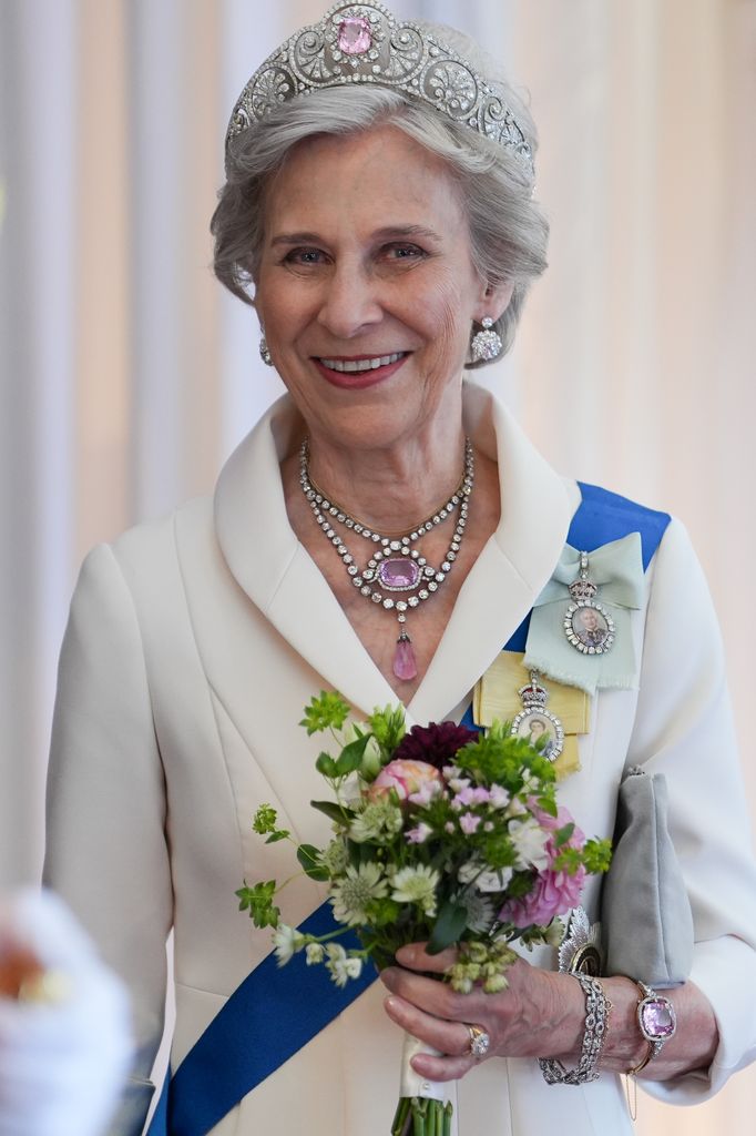 Duchess of Gloucester wearing Queen Mary's Honeysuckle tiara with kunzite