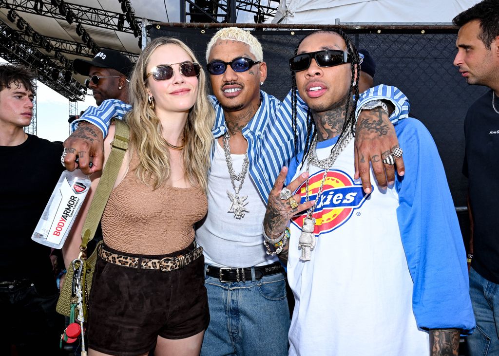 cara delevingne alexander edwards and tyga posing for photo at coachella