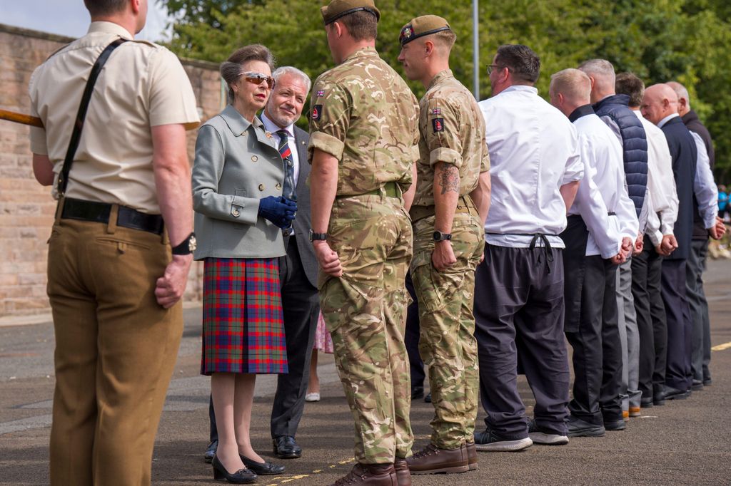 he Princess Royal meets performers and organisers during a rehearsal for this year's Royal Edinburgh Military Tattoo at Redford Barracks in Edinburgh. The Royal Edinburgh Military Tattoo is an annual series of military tattoos performed by British Armed Forces, Commonwealth and international military bands, and artistic performance teams on the Esplanade of Edinburgh Castle in the capital of Scotland. The event is held each August as one of the Edinburgh Festivals. Picture date: Wednesday July 30, 2025.