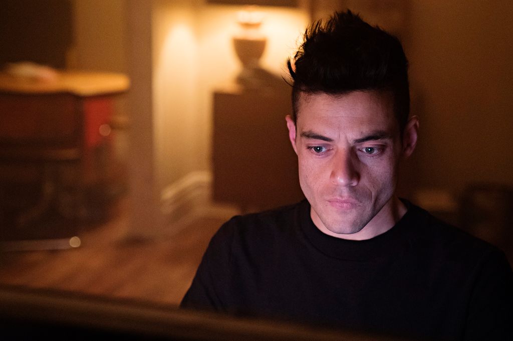 close-up of man looking at computer screen 