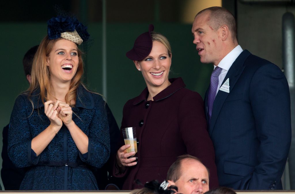 Princess Beatrice laughing with Zara Tindall and Mike Tindall