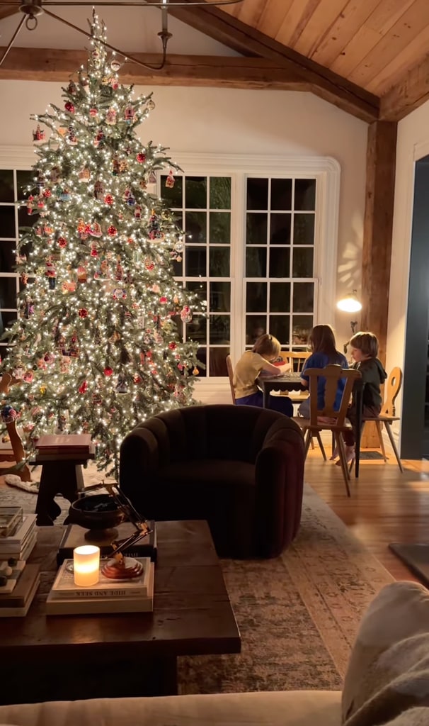 Still from a video shared by Joanna Gaines of her son Crew with friends at the puzzle table, surrounded by Christmas decorations at their Waco, Texas home