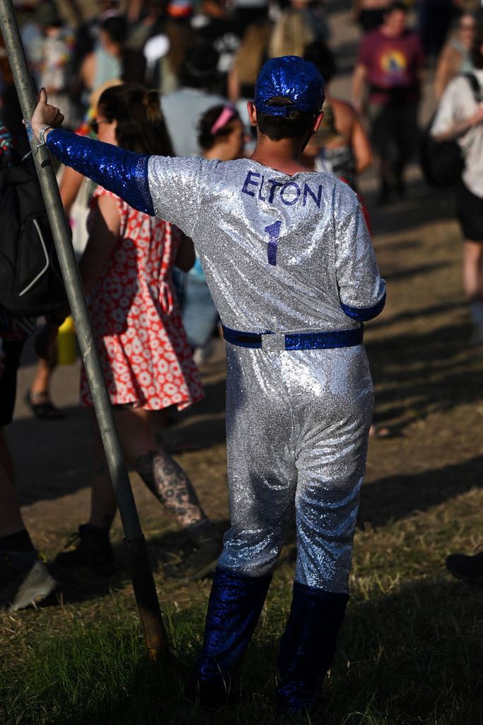 A guest oozed 70s Elton John in a metallic silver and blue all-in-one