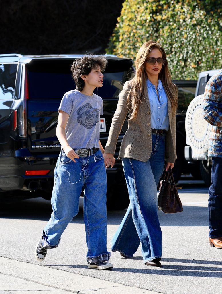 Jennifer Lopez  in tweed blazer and jeans spotted out and about in Los Angeles, holding hands with her daughter Emme