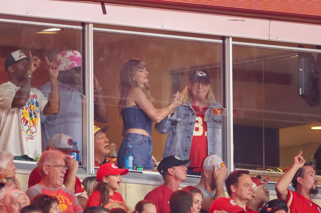 Taylor Swift reacts with Donna Kelce as the Kansas City Chiefs take on the Baltimore Ravens during the fourth quarter at GEHA Field at Arrowhead Stadium on September 05, 2024 in Kansas City, Missouri. 