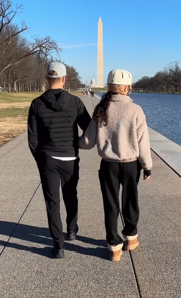 Photo shared by Derek Hough on Instagram December 2023 walking with his wife Hayley Erbert on the National Mall towards the Washington Monument amid her recent health scare