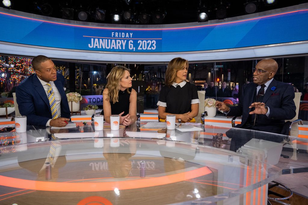 Hoda Kotb and Savannah Guthrie looking seriously off to the right