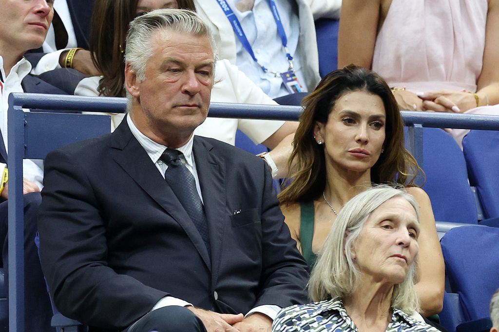 (L-R) Actor Alec Baldwin and wife Hilaria Baldwin look on during a First Round match on Day One of the 2024 US Open at the USTA Billie Jean King National Tennis Center on August 26, 2024 in the Flushing neighborhood of the Queens borough of New York City. (Photo by Jamie Squire/Getty Images)