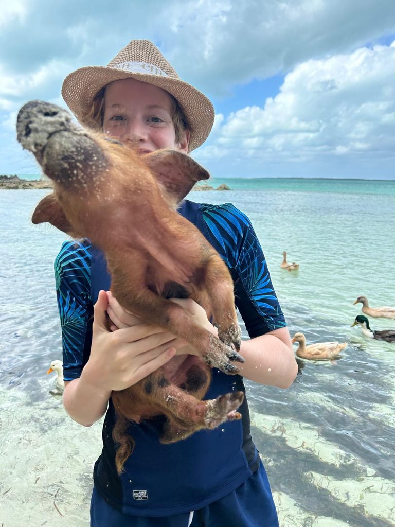 My teen having a cuddle with a piggie