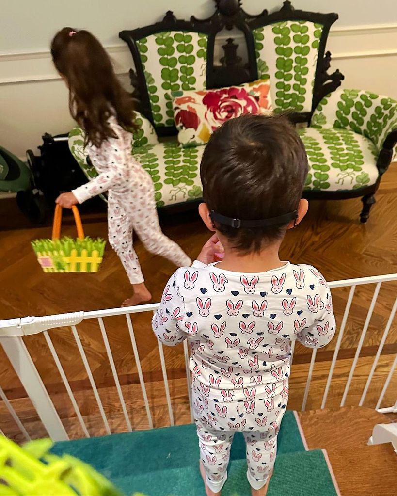 Mindy Kaling's kids playing next to a green chair