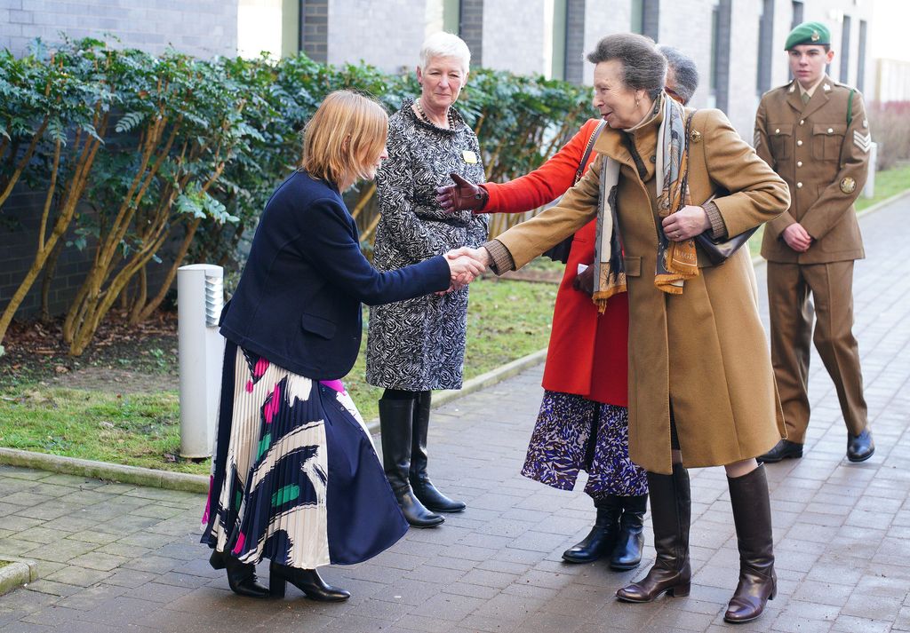 Princess Anne shaking hands at hospital