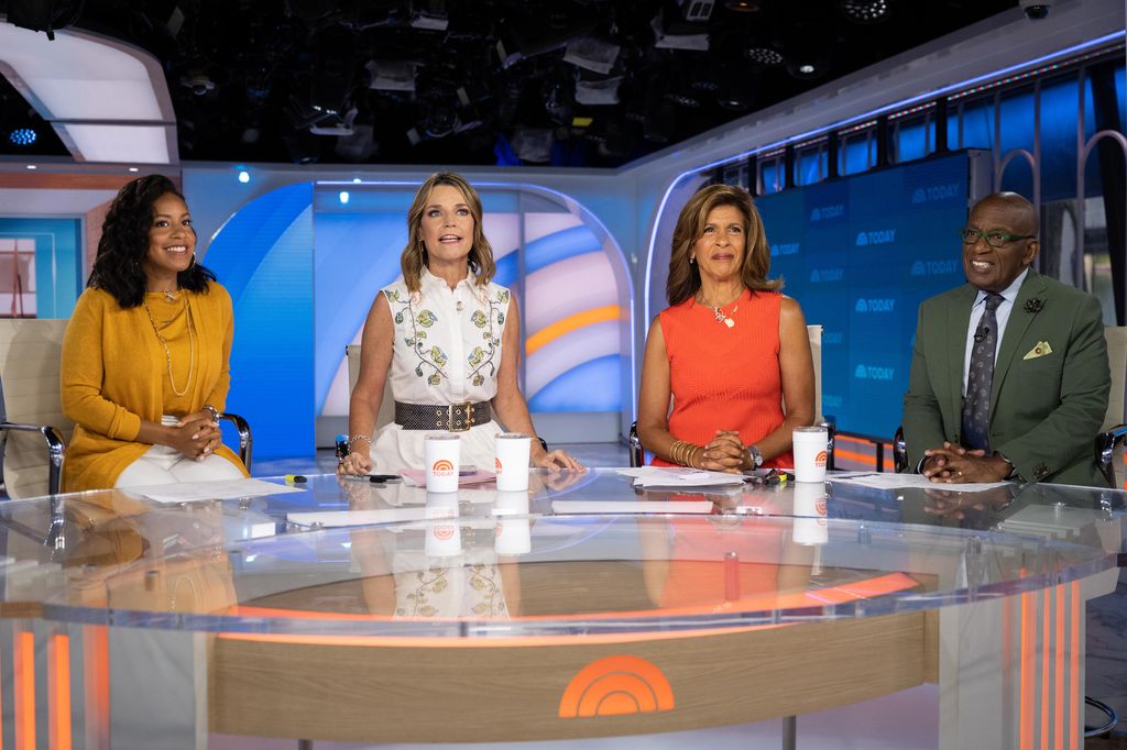 Today Show stars sitting at the NBC morning news desk