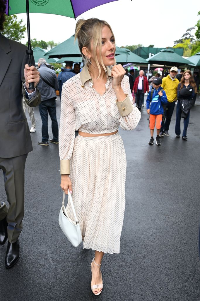 Sienna wore the chicest crop top and skirt set from Prada