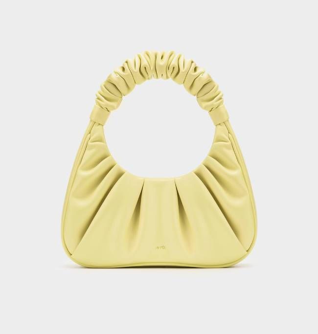 Emily Ratajkowski’s yellow handbag is perfect for summer - and it’s ...
