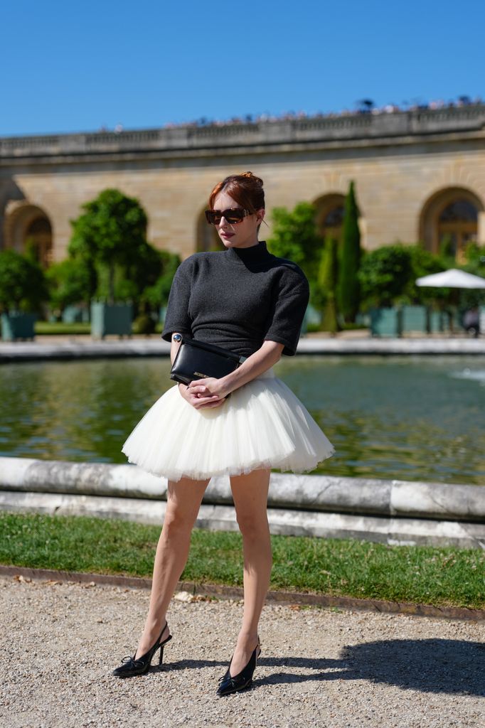 Emma showcases her super long legs 