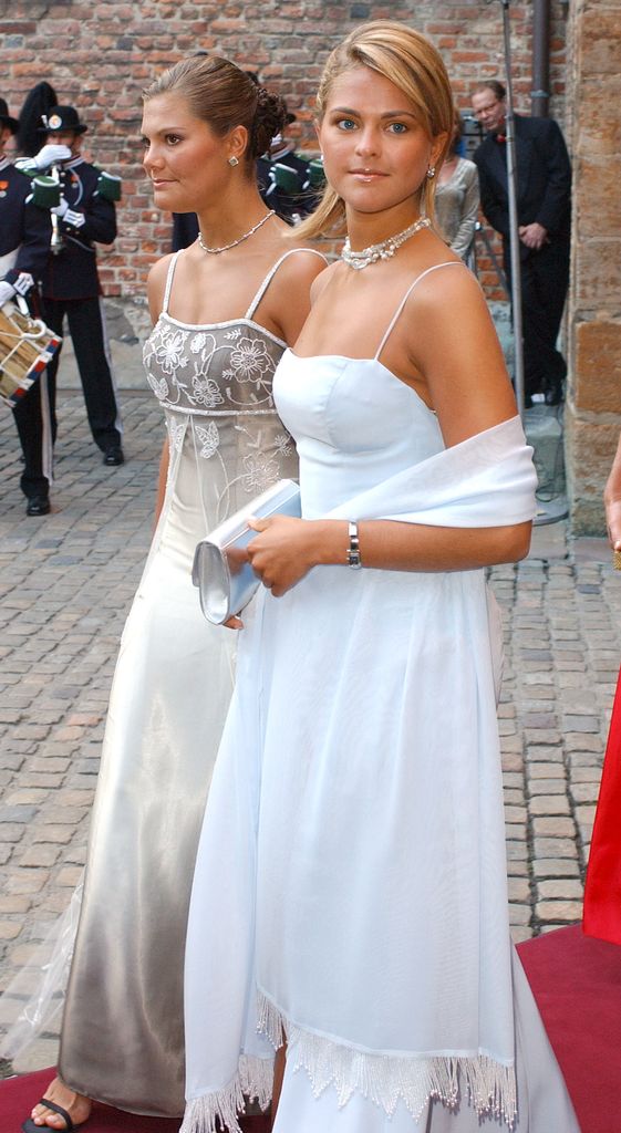 Young Crown Princess Victoria and Princess Madeleine in dresses