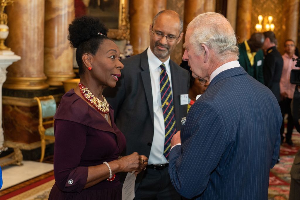 Baroness Floella Benjamin with then Prince Charles at a palace reception in 2022