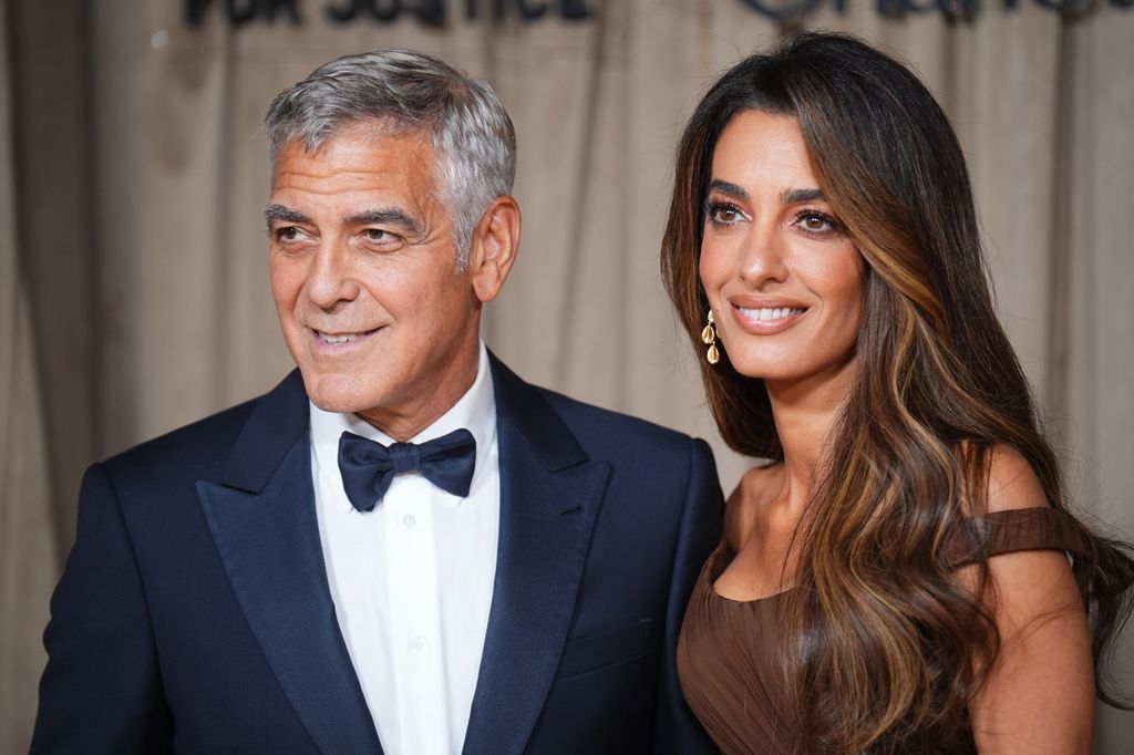 George and Amal Clooney arrive at the Albie Awards at the Natural History Museum in London