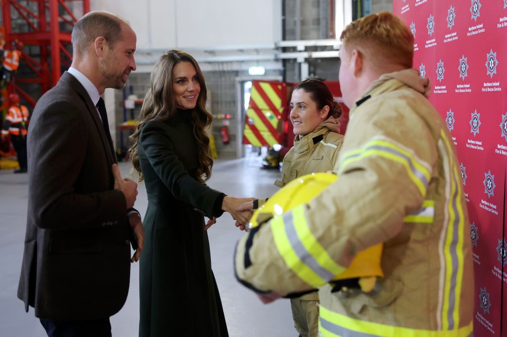 William and Kate speaking with firefighters