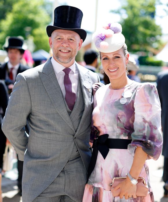 Mike Tindall wearing a top hat and Zara Tindall in a pretty floral dress