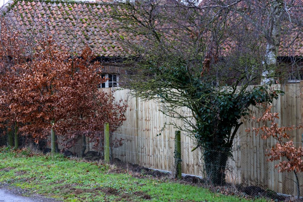 fence around farmhouse