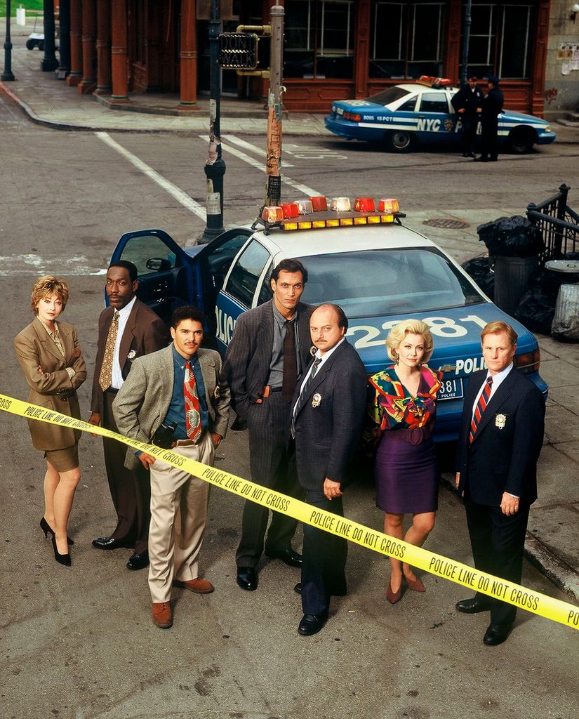 UNITED STATES - SEPTEMBER 11:  NYPD BLUE - gallery - Season Two - 9/11/94, Jimmy Smits (center, as Det. Bobby Simone) joined co-stars Sharon Lawrence, James McDaniel, Nicholas Turturro, Dennis Franz, Gail O'Grady and Gordon Clapp on the set of the Disney General Entertainment Content via Getty Images police drama "NYPD Blue." Smits, who replaced David Caruso in the second season, was first seen in the "Simone Says" episode of the series.,  (Photo by Timothy White/Disney General Entertainment Content via Getty Images)