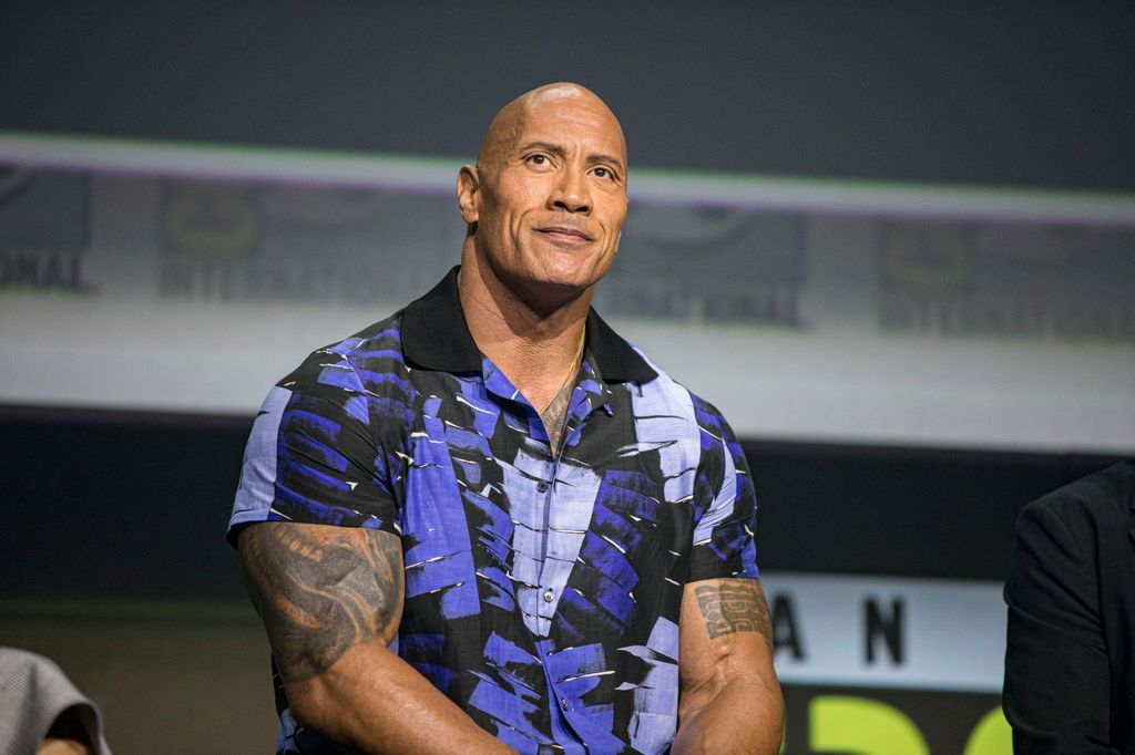 dwayne johnson panel purple shirt