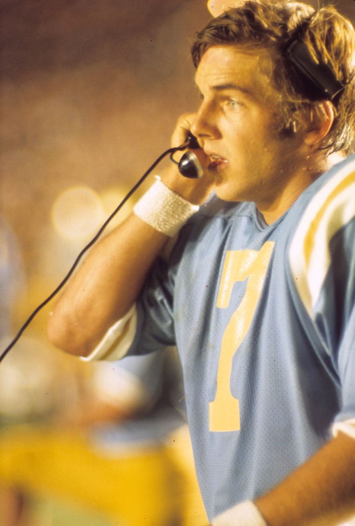 College Football: Closeup of UCLA QB Mark Harmon (7) on the phone on the sidelines during game vs Nebraska at Rose Bowl Stadium. 
Pasadena, CA 9/9/1972