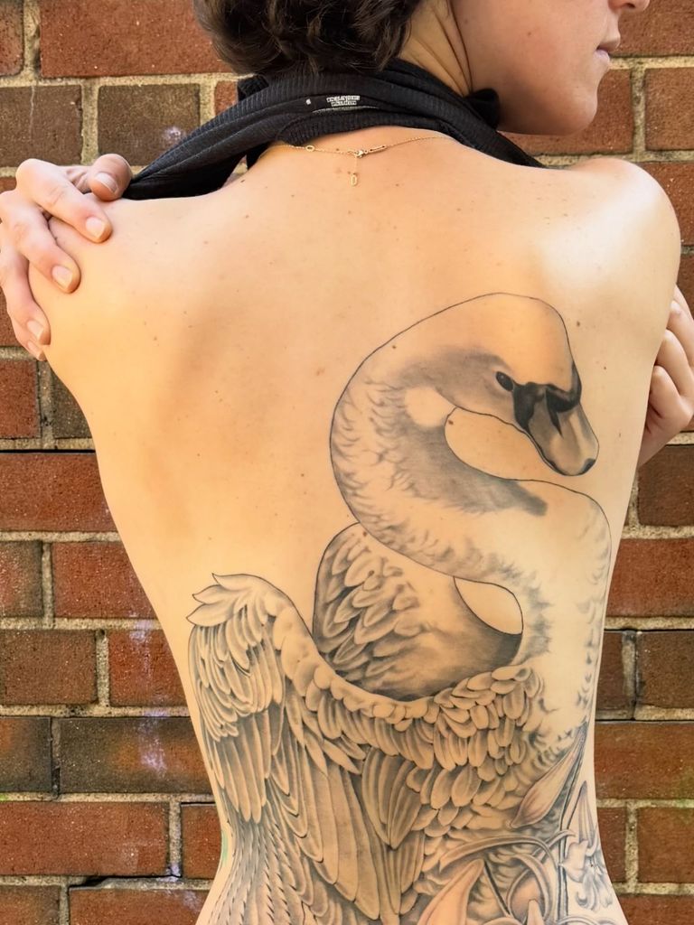 photo of ella emhoff huge swan tattoo on back