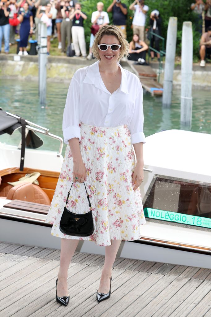 Greta Gerwig arrives at Palazzo del CasinÃ² for the âJay Kellyâ photocall during the 82nd Venice International Film Festival on August 28, 2025 in Venice, Italy