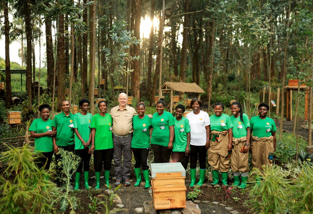 Prince Albert with beekeepers in Rwanda
