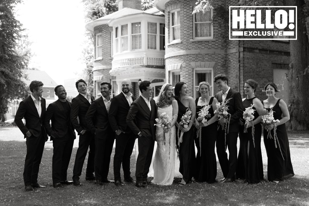 Alberto Rosende and Tessa Mossey (C) with their wedding party