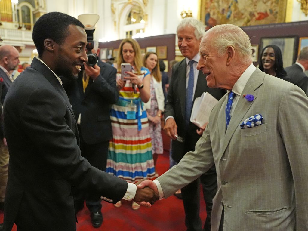 Charles speaking with Phillip Butah