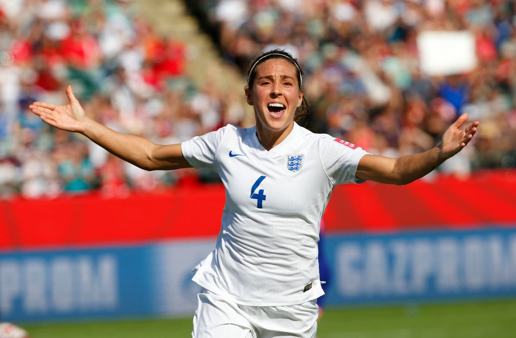 Fara Williams running in england kit