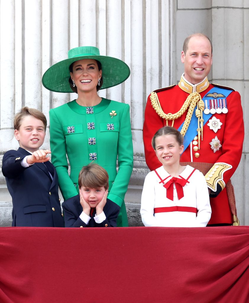 Princess Kate and Prince William standing behind Prince George, Prince Louis and Princess Charlotte