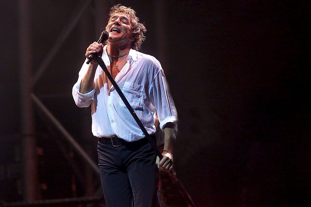 The singer performing at Glastonbury Festival in 2002 