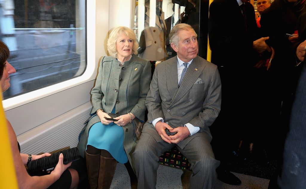 duchess of cornwall and prince charles on metropolitan underground train