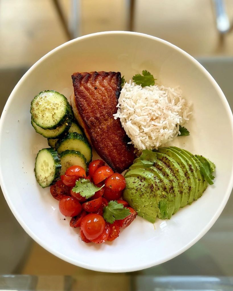Megan Thee Stallion meal with salmon rice avocado and salad