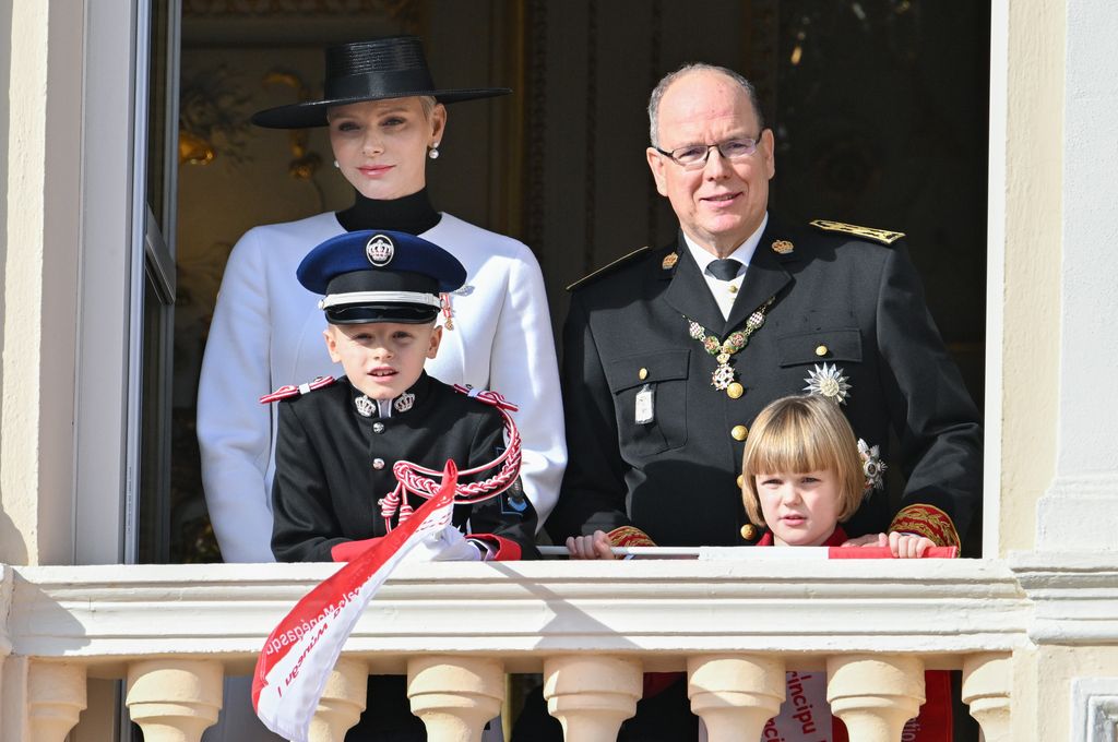 Princess Charlene of Monaco, Prince Albert II of Monaco with Prince Jacques of Monaco and Princess Gabriella of Monaco appear at the Palace balcony during  the Monaco National Day on November 19, 2022 in Monte-Carlo