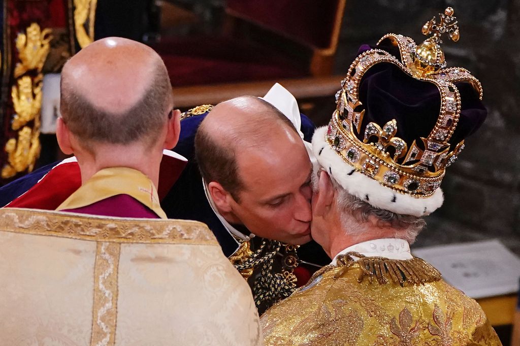 Prince William kisses King Charles after being crowned