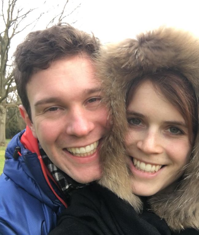 Jack Brooksbank and Princess Eugenie hugging and smiling