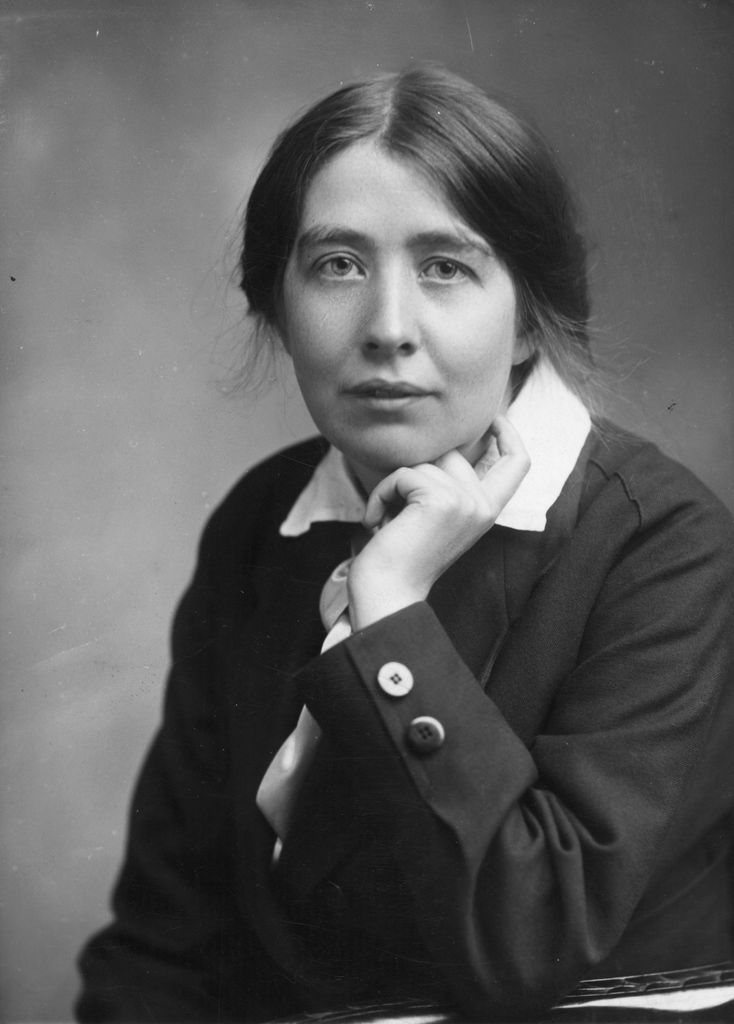 Sylvia Pankhurst sitting with her hand under her chin