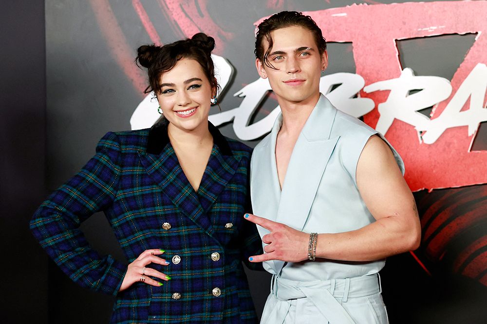 Mary Mouser and Tanner Buchanan at the Cobra Kai premiere in 2022