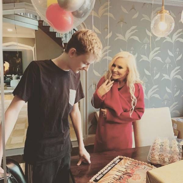Jenny McCarthy with her son Evan inside her home