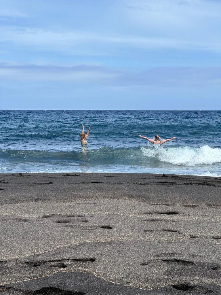 Women splashing in the sea