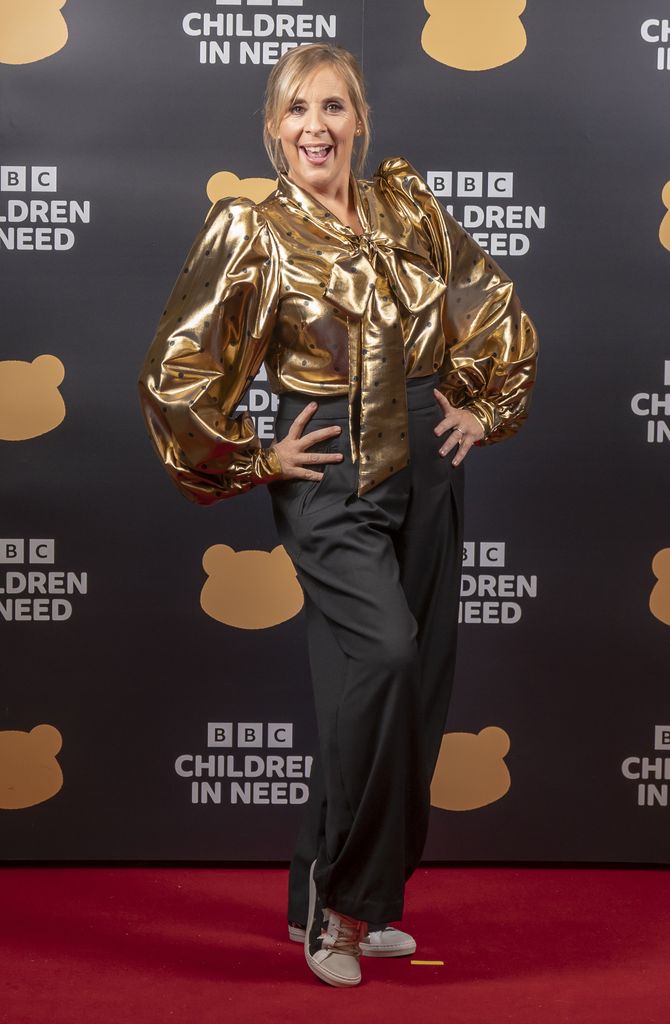 Mel Giedroyc in a spotty gold blouse